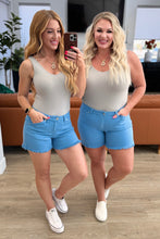 Load image into Gallery viewer, Celeste Mid Rise Shield Pocket Cutoff Shorts in Sky Blue