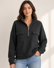 Load image into Gallery viewer, Model wearing black half-zip pullover - front