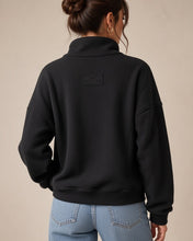Load image into Gallery viewer, Model wearing black half-zip pullover - back