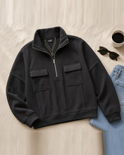 Load image into Gallery viewer, Black half-zip pullover flat lay